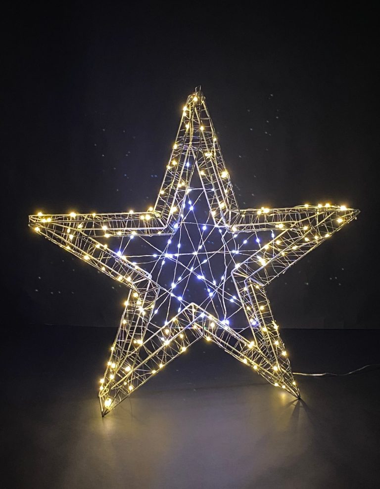 Leuchtender Weihnachtsstern aus Draht mit weißen und gelben Lichtern vor schwarzem Hintergrund.